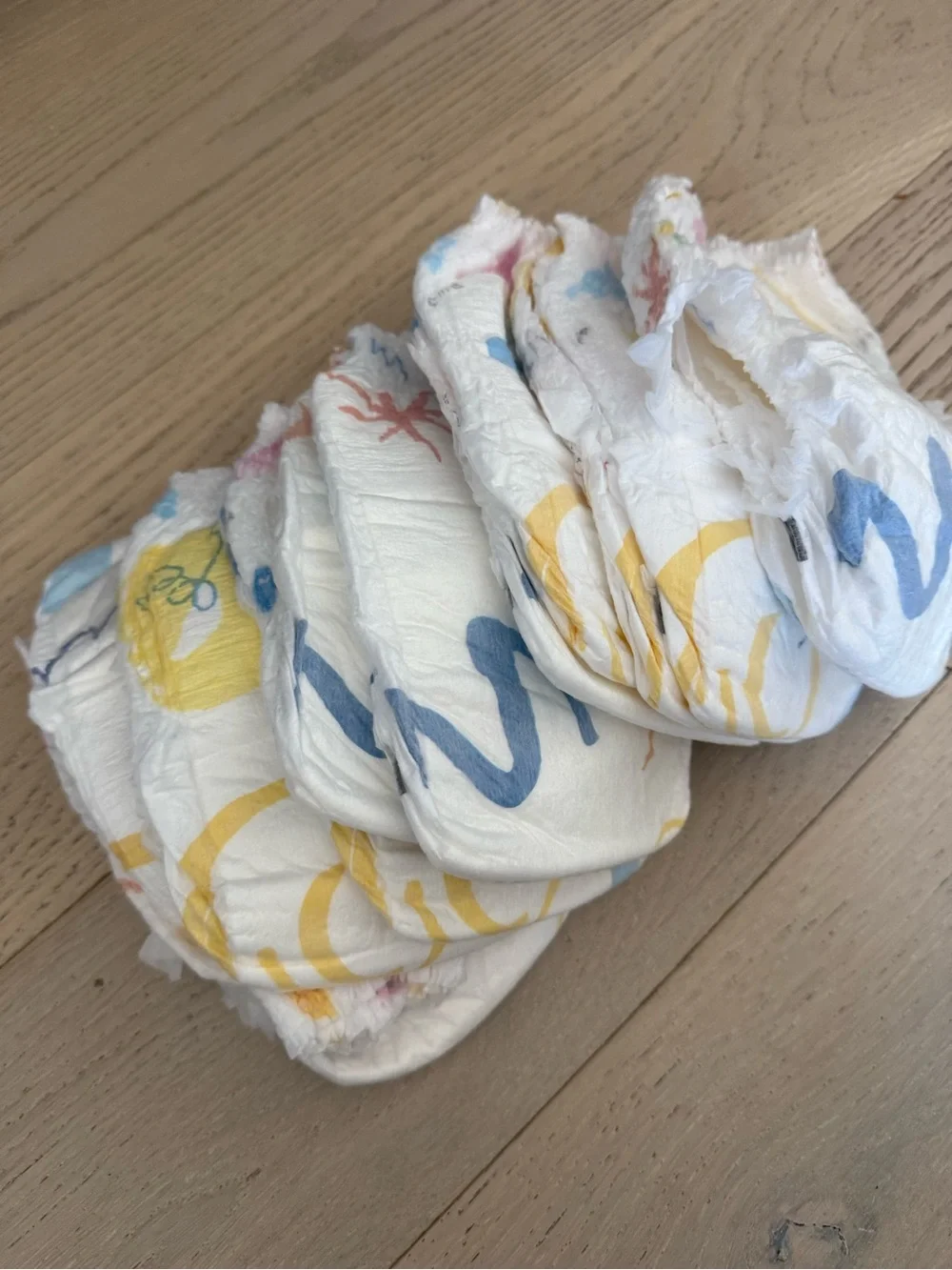 Coterie Kids Swim Diaper - White with Pink & Yellow Print. Small. 11 diapers